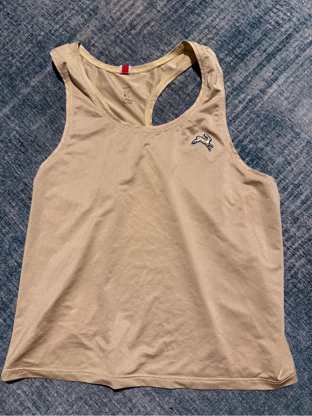 Tracksmith twilight crop tank gold